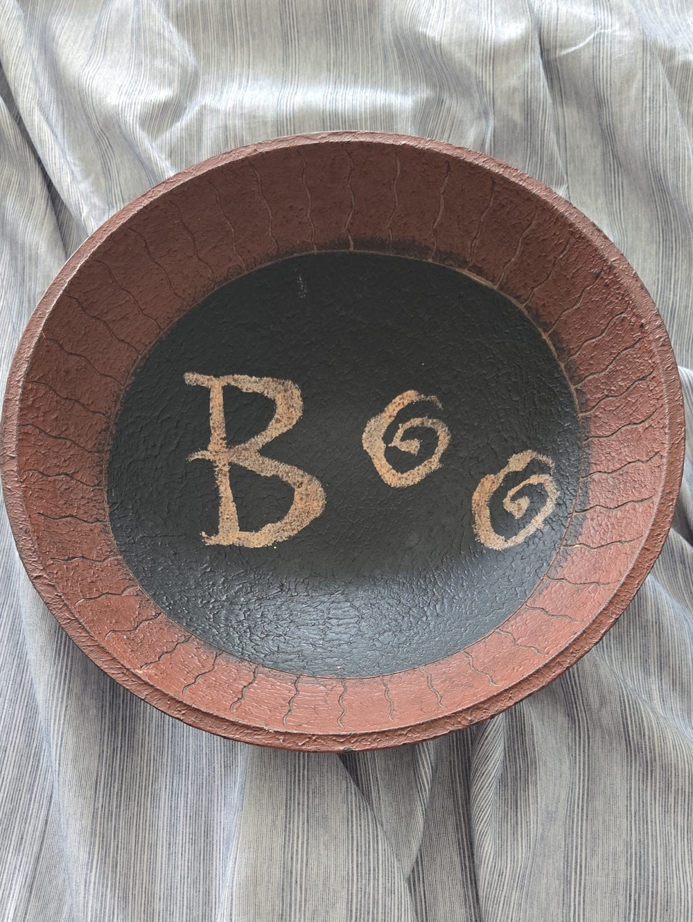 Handcrafted Black & Brown Decorative Wall Bowl with 'Boo' Accent, 11 Inches.
